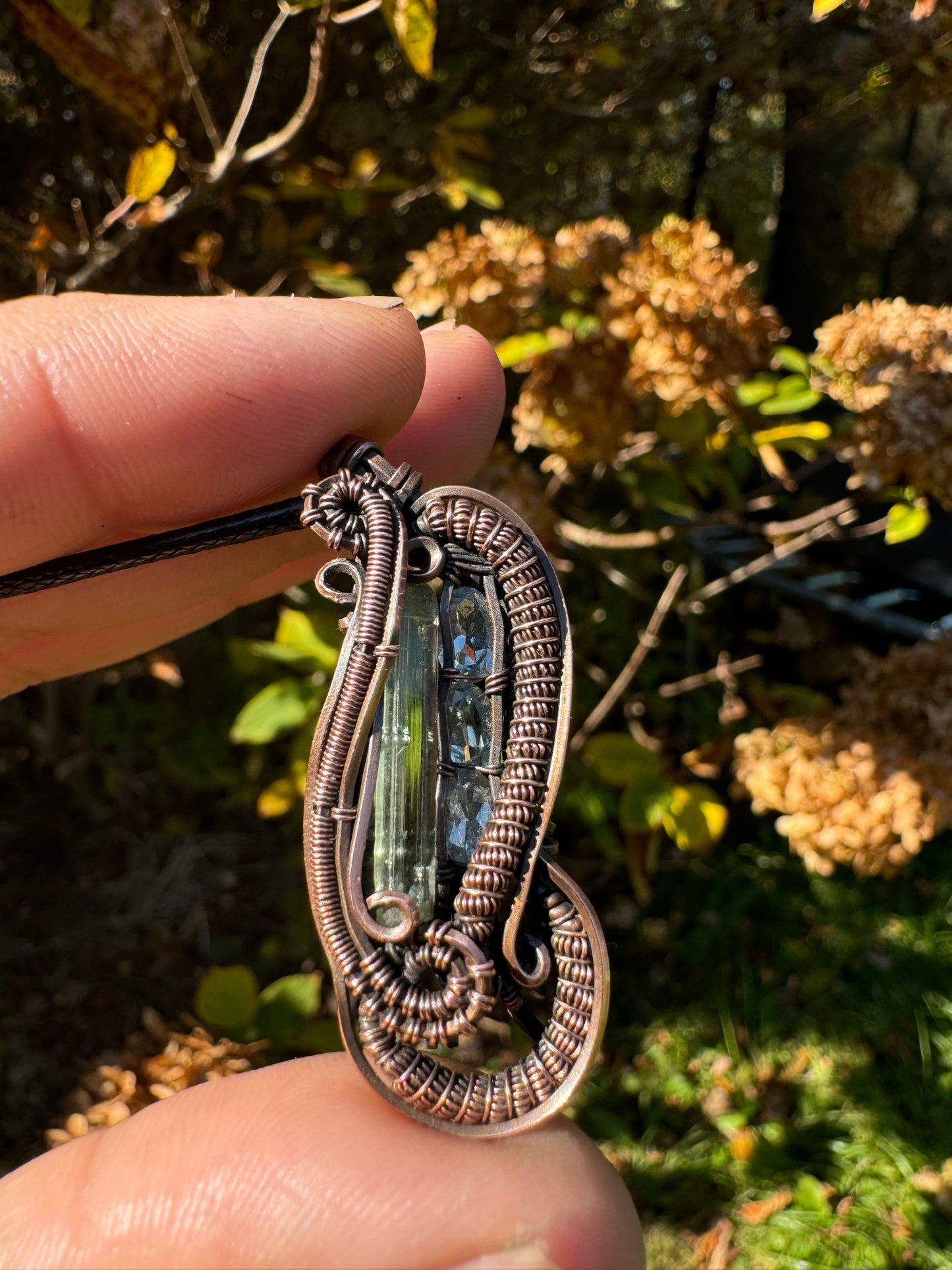 Green Tourmaline and Aquamarine in Copper