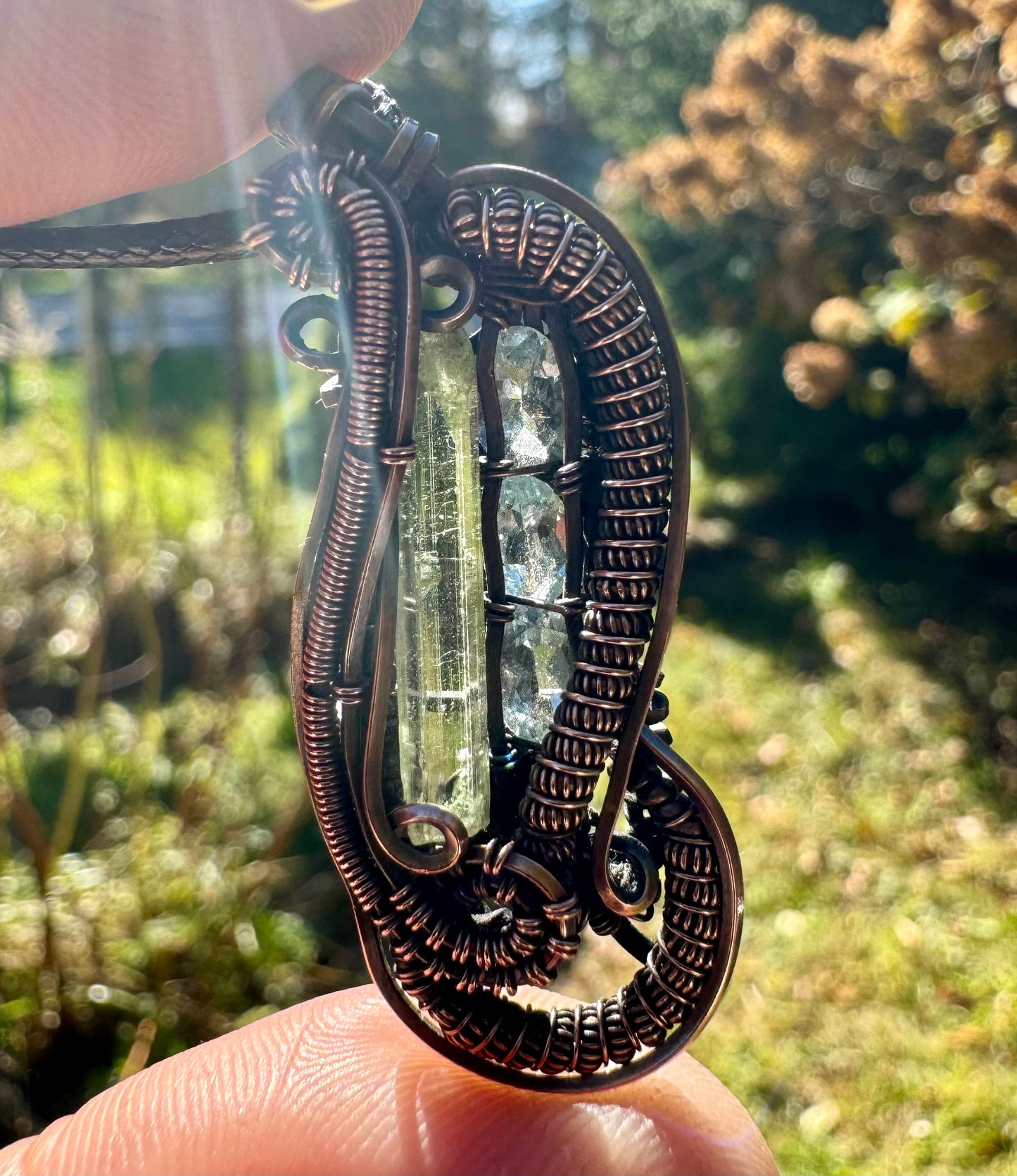 Green Tourmaline and Aquamarine in Copper